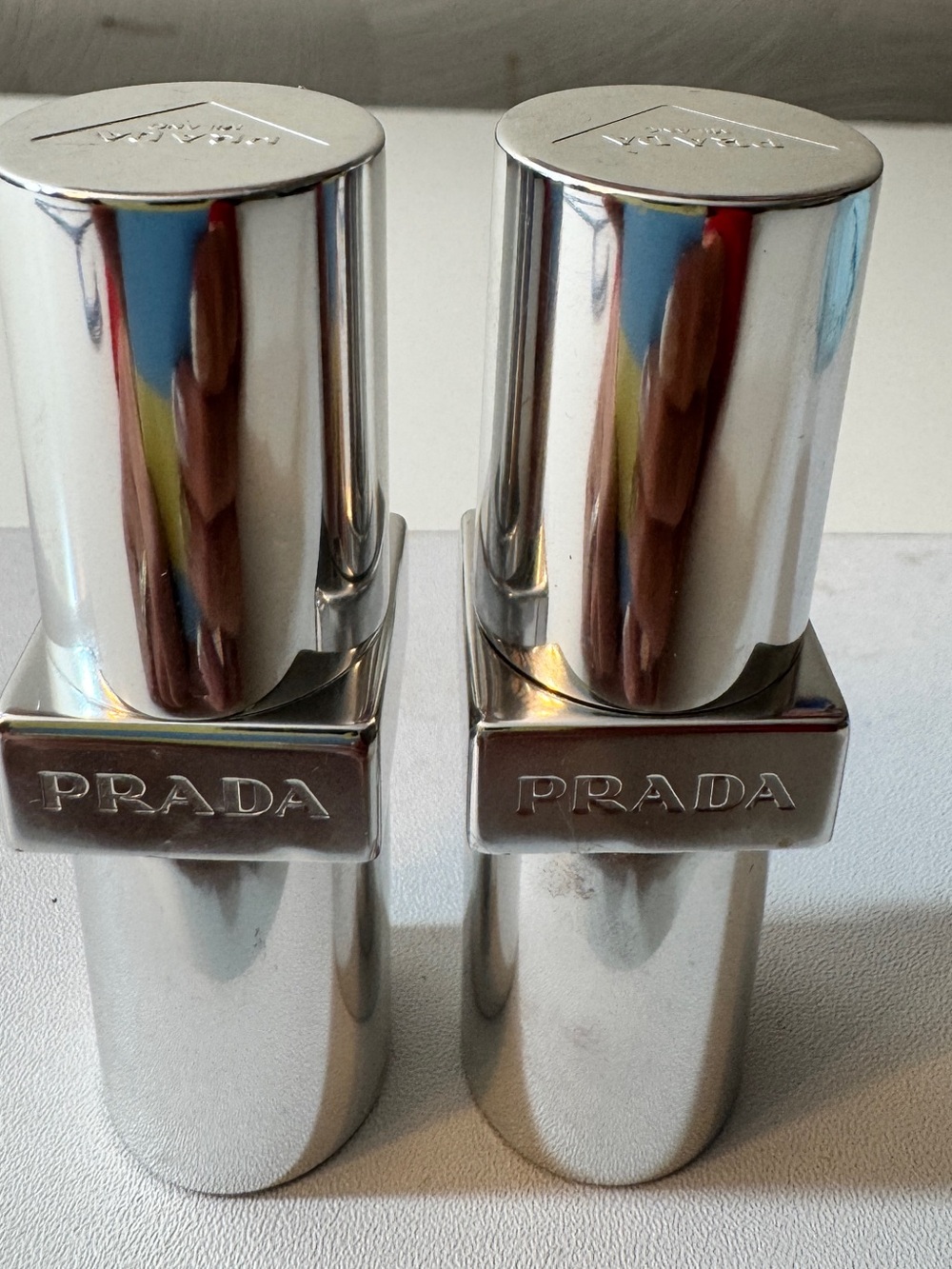 PRADA LIPSTICK - REFILLABLE CASE! 
THIS LISTING IS FOR SET OF 2